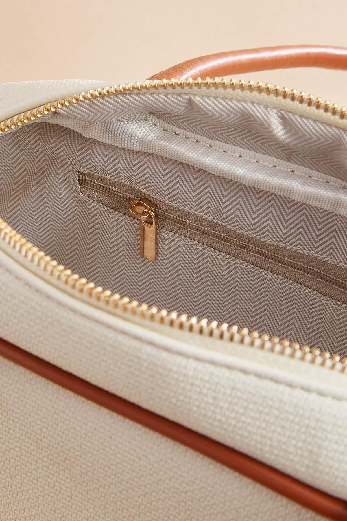 Versona contrast piped bowler bag COGNAC