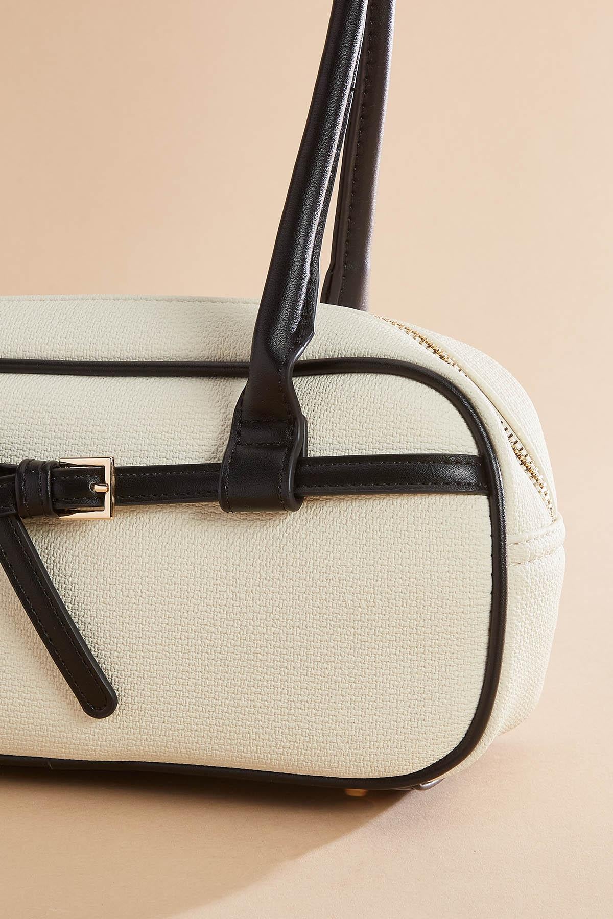 Versona buckle embellished piped bowler bag BLACK