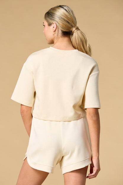 Versona spring spread scuba top