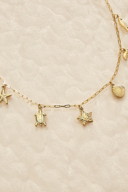 Versona waterproof ocean life charm necklace GOLD