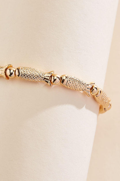 Versona gold fish icon stretch bracelet GOLD