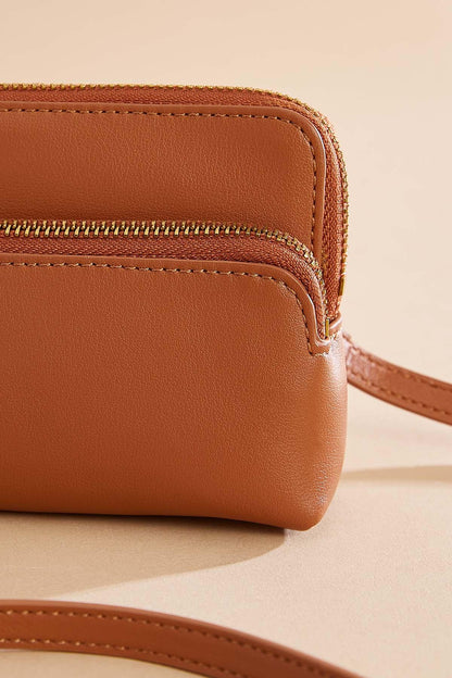 Versona genuine leather crossbody COGNAC